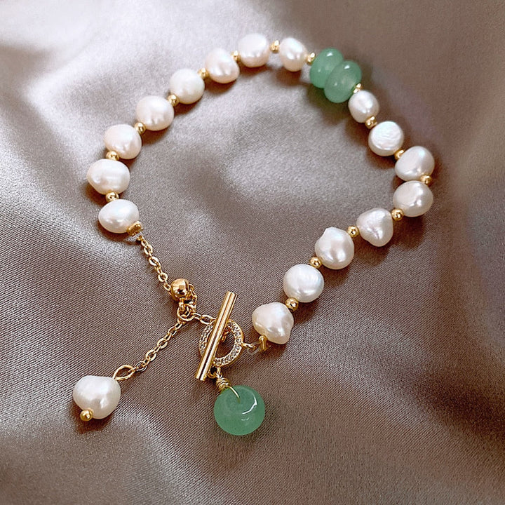 Pulsera aventura con perlas de mar