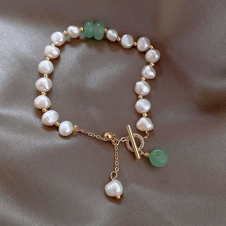 Pulsera aventura con perlas de mar